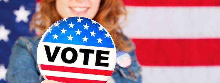 Woman Holding Vote Pin