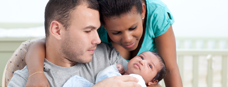 Couple Holding Baby